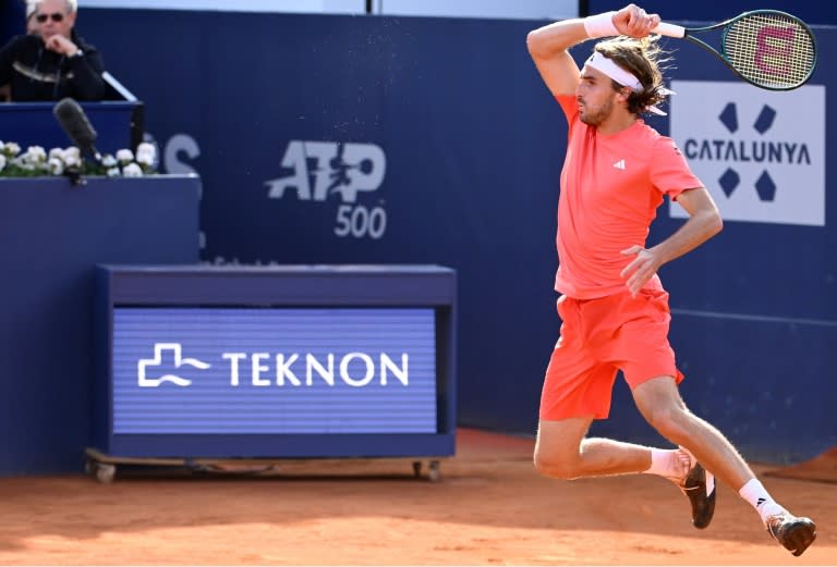 Stefanos Tsitsipas defeated <a class="link " href="https://sports.yahoo.com/soccer/teams/serbia/" data-i13n="sec:content-canvas;subsec:anchor_text;elm:context_link" data-ylk="slk:Serbia;sec:content-canvas;subsec:anchor_text;elm:context_link;itc:0">Serbia</a>'s Dusan Lajovic to reach the Barcelona Open final against Casper Ruud (Josep LAGO)