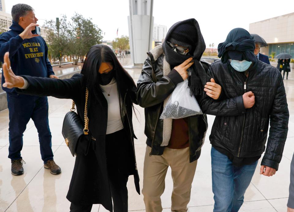 Alexander Smirnov, second from right, leaves the courthouse on Feb. 20, 2024, in Las Vegas. Smirnov, a former FBI informant charged with lying about a multimillion-dollar bribery scheme involving President Joe Biden’s family, was scheduled to appear in a California federal court on Feb. 26, as a judge considers whether he must remain behind bars while he awaits trial. Special counsel David Weiss’ office is pressing Judge Otis Wright II to keep Smirnov in jail, arguing the man who claims to have ties to Russian intelligence is likely to flee the country.
