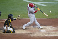 St. Louis Cardinals' Yadier Molina, right, lines out to Pittsburgh Pirates second baseman Tucupita Marcano in a pinch hit appearance in the seventh inning of a baseball game, Wednesday, Oct. 5, 2022, in Pittsburgh. (AP Photo/Keith Srakocic)