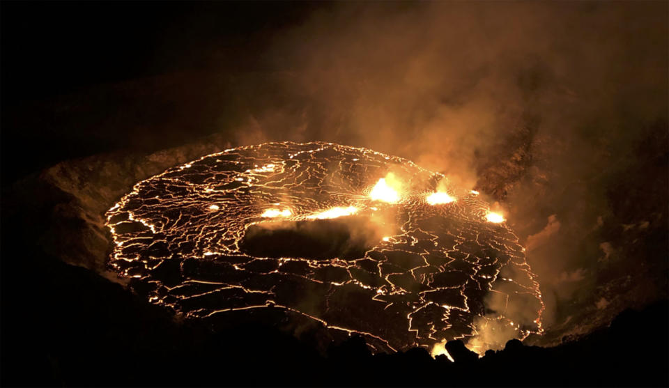 This photo provided by USGS shows the eruption within in Kilauea volcano's Halemaumau crater at the volcano's summit on Wednesday, Sept. 30, 2021. One of the most active volcanos on Earth is erupting on Hawaii's Big Island. (USGS via AP)