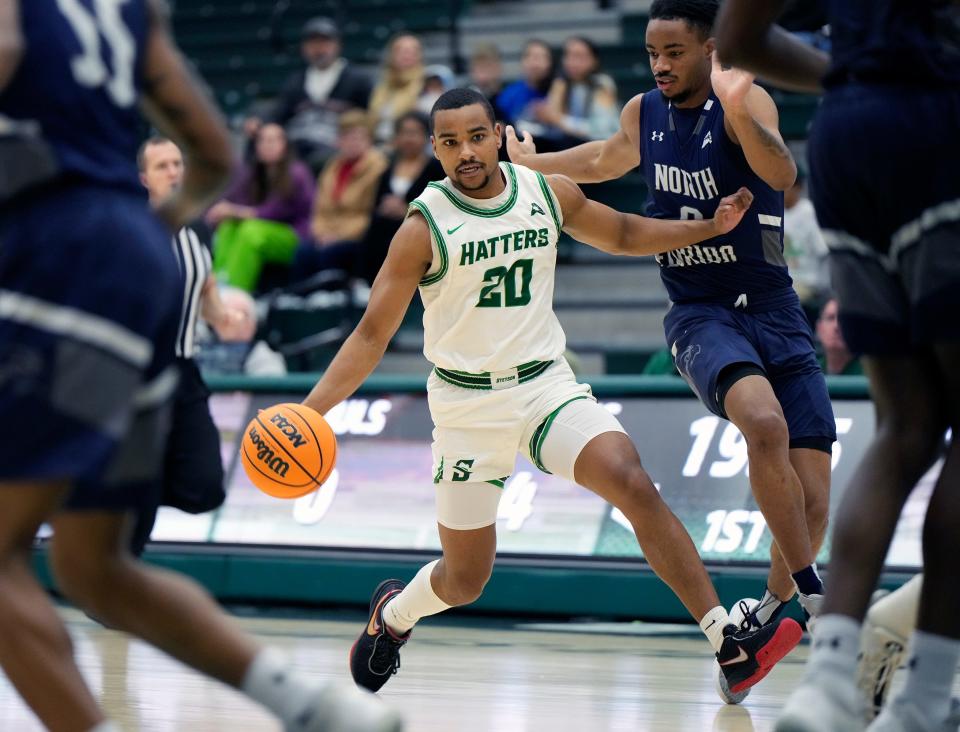 Stetson's Stephan Swenson attempts to drive to the basket during a game with North Florida at Stetson Edmunds Center in DeLand, Jan. 4, 2024.