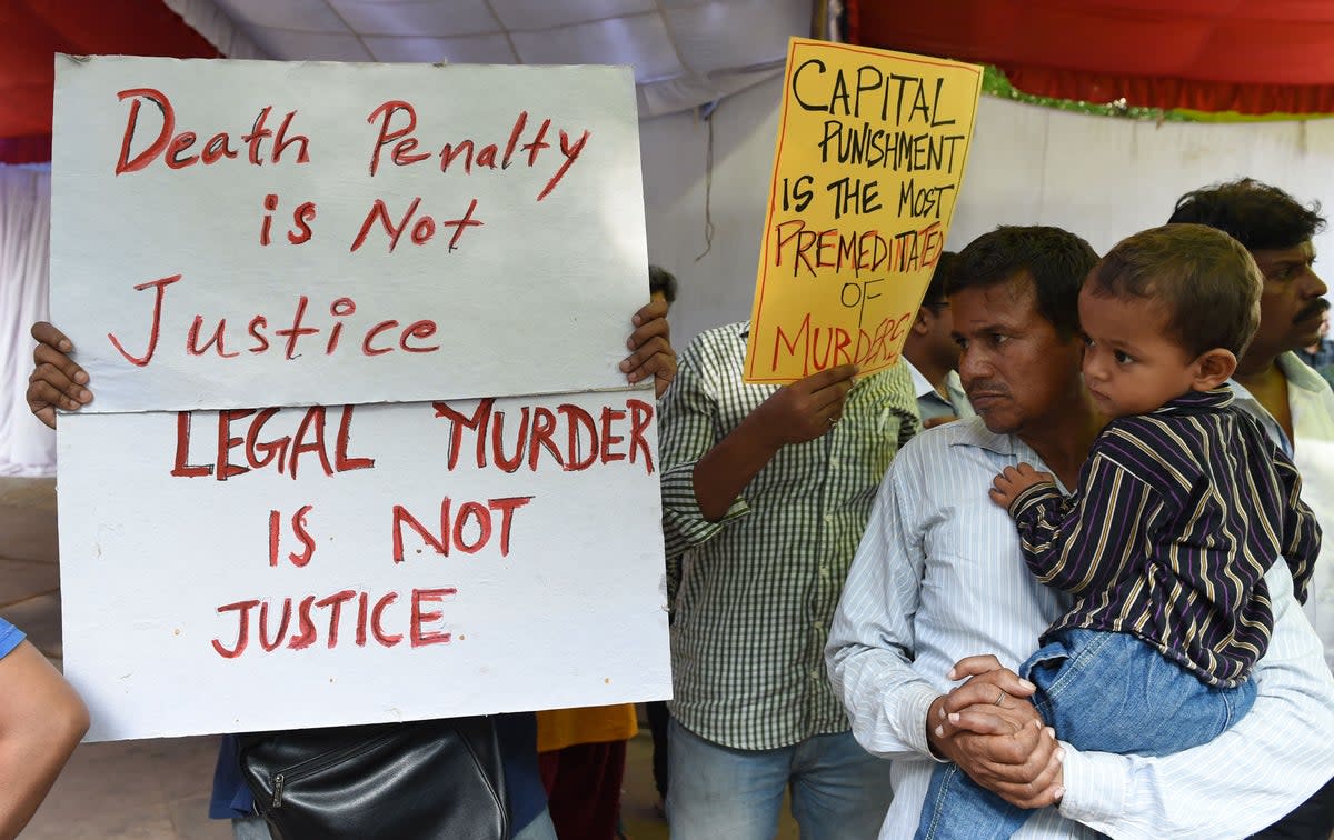 Indian activists during a protest against capital punishment in New Delhi on 30 July 2015 (AFP via Getty)