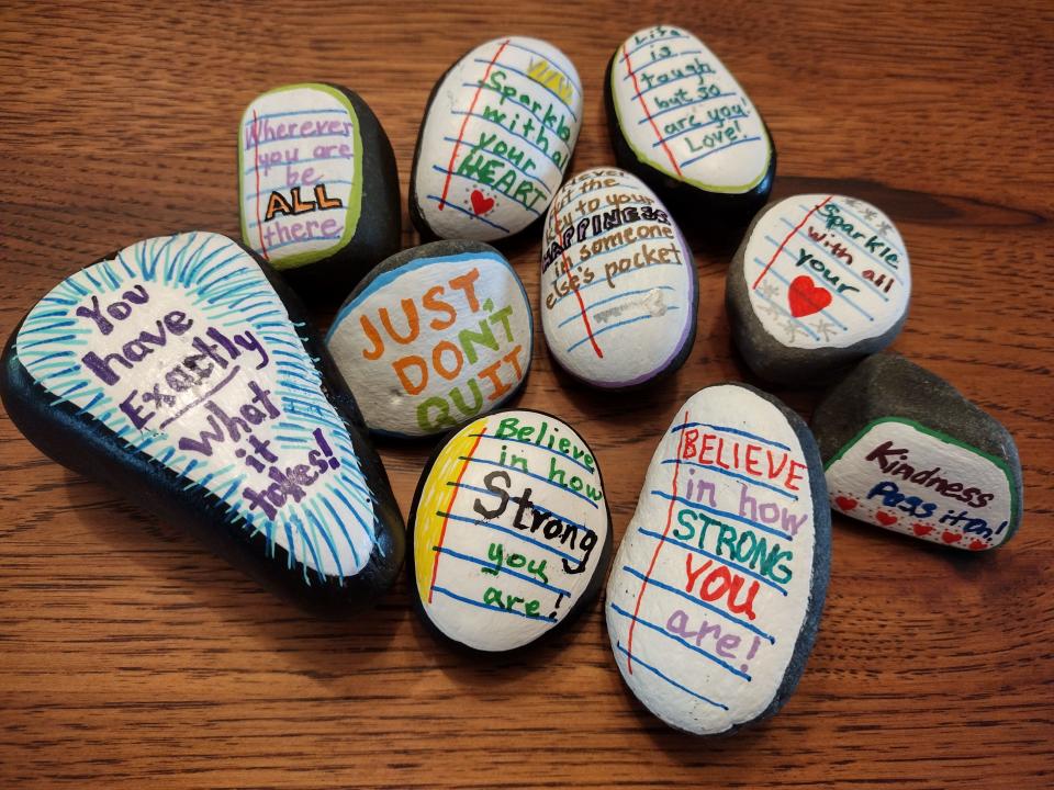 Some of the kindess rocks created by Nu Alpha Gamma Chapter members during the May 6 chapter meeting.