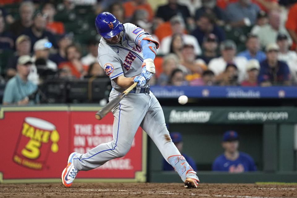 New York Mets' Pete Alonso hits a two-run home run against the Houston Astros during the sixth inning of a baseball game Wednesday, June 21, 2023, in Houston. (AP Photo/David J. Phillip)