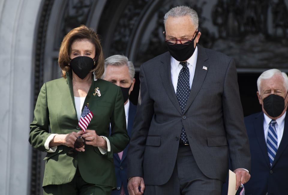 Senate Majority Leader Charles Schumer, D-N.Y., Speaker of the House Nancy Pelosi, D-Calif., House Majority Leader Steny Hoyer, D-Md., right, and House Minority Leader Kevin McCarthy, R-Calif., arrive for a remembrance ceremony on the east front steps of the U.S. Capitol for the 20th anniversary of the 9/11 terrorist attacks on Monday, September 13, 2021. (Tom Williams/CQ Roll Call via Getty Images)