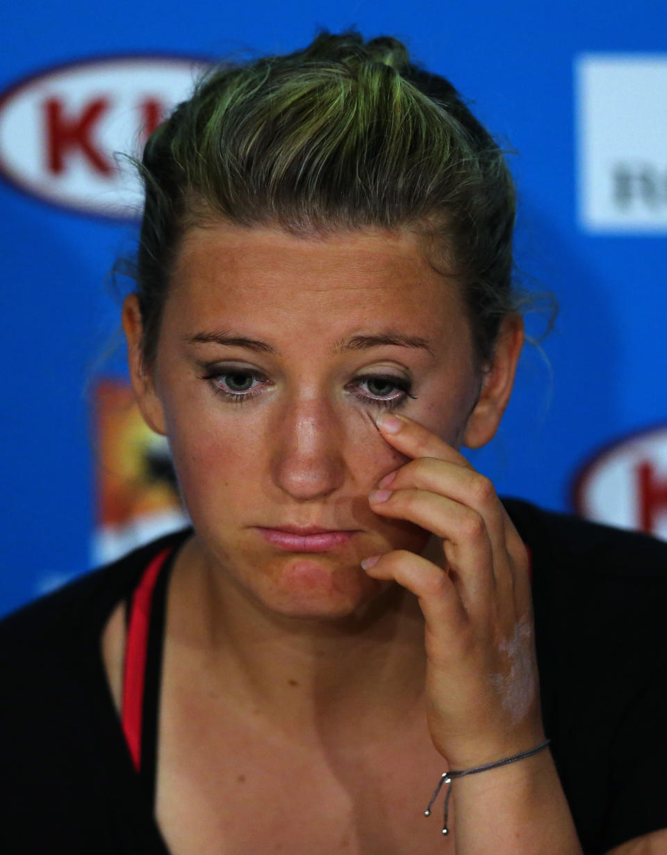 Victoria Azarenka of Belarus speaks during a press conference after her quarterfinal loss to Agnieszka Radwanska of Poland at the Australian Open tennis championship in Melbourne, Australia, Wednesday, Jan. 22, 2014. (AP Photo/Shuji Kajiyama)