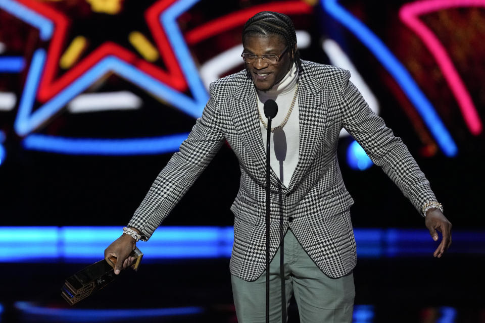 Baltimore Ravens' Lamar Jackson, AP Most valuable player speaks during the NFL Honors award show ahead of the Super Bowl 58 football game Thursday, Feb. 8, 2024, in Las Vegas. The San Francisco 49ers face the Kansas City Chiefs in Super Bowl 58 on Sunday. (AP Photo/David J. Phillip)