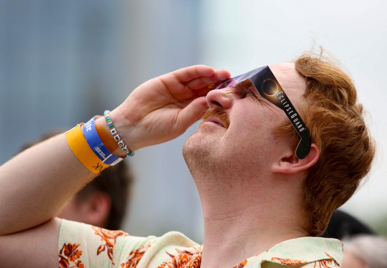 Vampire Weekend performs at the Moody Amphitheater at Waterloo Park in Austin, Monday, April 8, 2024, for a total solar eclipse show. Thousands attended and were equipped with solar eclipse glasses and watched as the eclipse reached totality, while the band paused their performance.