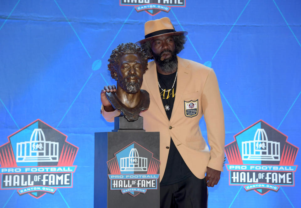 Aug 3, 2019; Canton, OH, USA; Ed Reed poses with bust during the Pro Football Hall of Fame Enshrinement at Tom Benson Hall of Fame Stadium. Mandatory Credit: Kirby Lee-USA TODAY Sports