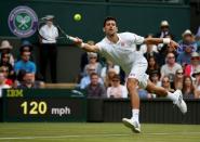 Britain Tennis - Wimbledon - All England Lawn Tennis & Croquet Club, Wimbledon, England - 27/6/16 Serbia's Novak Djokovic in action against Great Britain's James Ward REUTERS/Paul Childs