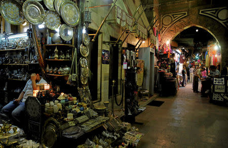 Vendors wait for customers in a popular tourist area named "Khan el-Khalili" at al-Hussein and Al-Azhar districts in old Islamic Cairo, Egypt August 18, 2016. Picture taken August 18, 2016. REUTERS/Amr Abdallah Dalsh