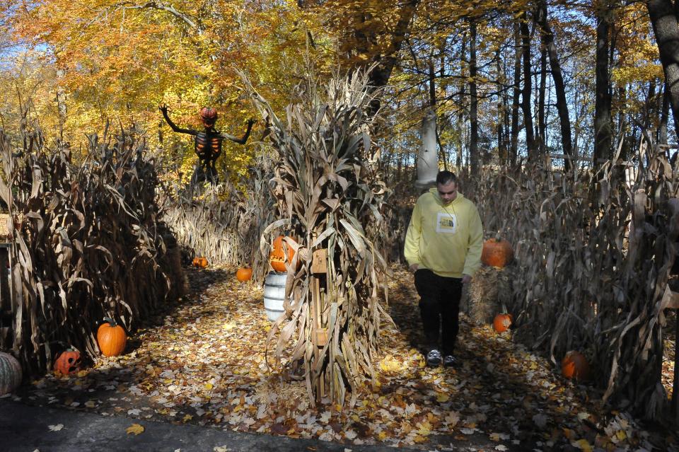 A haunted corn maze awaits visitors to the Hunter family's backyard.