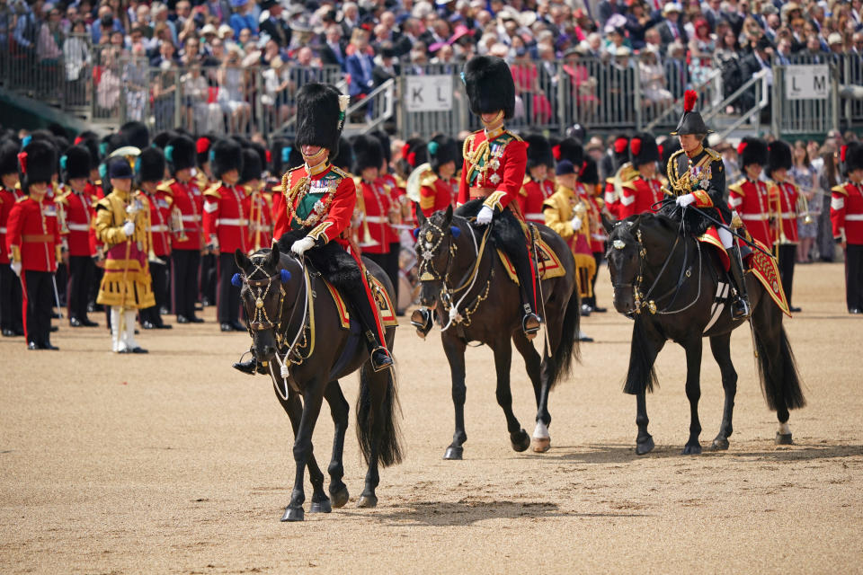 LONDON, ENGLAND - JUNE 02: (R to L)  Princess Anne, Princess Royal,  Prince William, Duke of Cambridge and Prince Charles, Prince of Wales and during the Trooping the Colour ceremony at Horse Guards Parade, central London, as the Queen celebrates her official birthday, on day one of the Platinum Jubilee celebrations.  on June 2, 2022 in London, England. Trooping The Colour, also known as The Queen's Birthday Parade, is a military ceremony performed by regiments of the British Army that has taken place since the mid-17th century. It marks the official birthday of the British Sovereign. This year, from June 2 to June 5, 2022, there is the added celebration of the Platinum Jubilee of Elizabeth II  in the UK and Commonwealth to mark the 70th anniversary of her accession to the throne on 6 February 1952. (Photo by Yui Mok/WPA Pool/Getty Images)