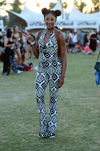 We are head-over-heels in lust with this look. The aztec print jumpsuit and double bun hairstyle is the epitome of fab festival style. 