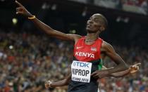 Asbel Kiprop of Kenya reacts after winning the men's 1500 metres final during the 15th IAAF World Championships at the National Stadium in Beijing, China, August 30, 2015. REUTERS/Phil Noble