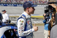 Christopher Bell reacts after taking the pole position during qualifying for the NASCAR Cup YellaWood 500 auto race, Saturday, Oct. 1, 2022, in Talladega, Ala. (Photo/Butch Dill)