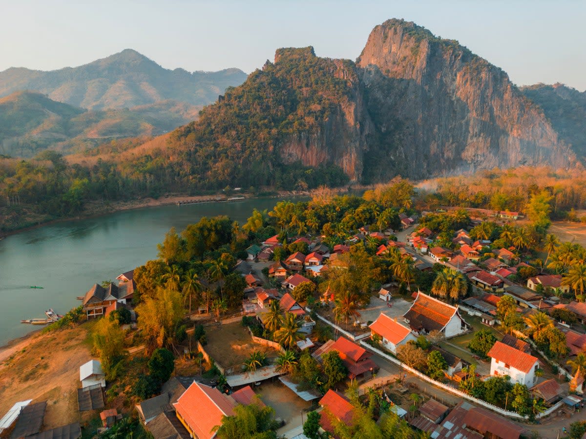 Luang Prabang is a city in Laos consisting of 58 villages bordering the Mekong River (Getty Images)