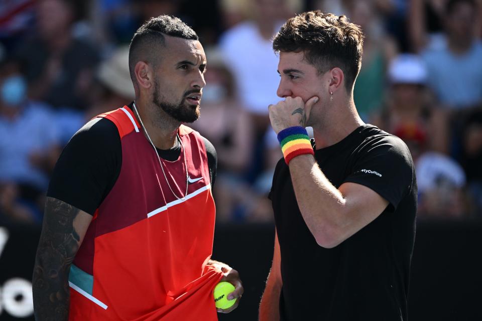 Nick Kyrgios and doubles partner Thanasi Kokkinakis during the third round of the doubles competition at the 2022 Australian Open.