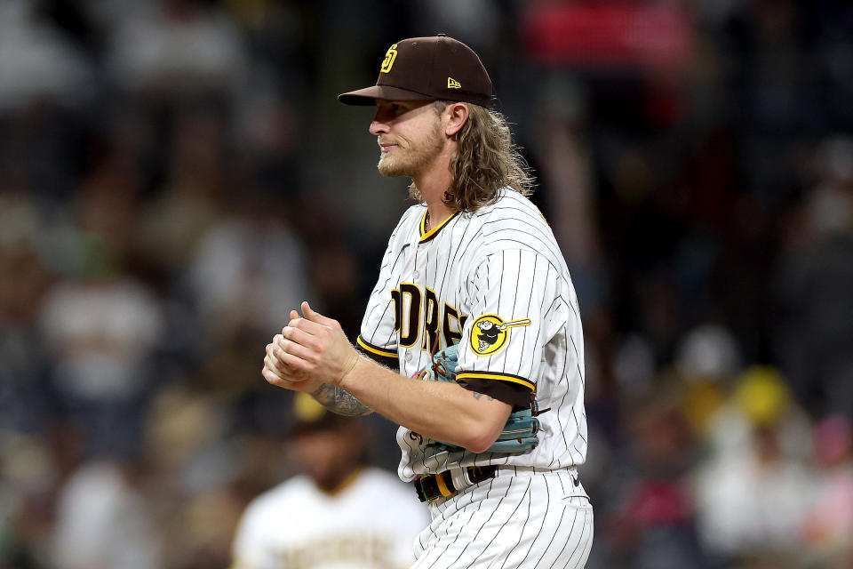 Josh Hader reacts after allowing a hit in the ninth inning, ending the Padres' no-hit bid. (Sean M. Haffey/Getty Images)