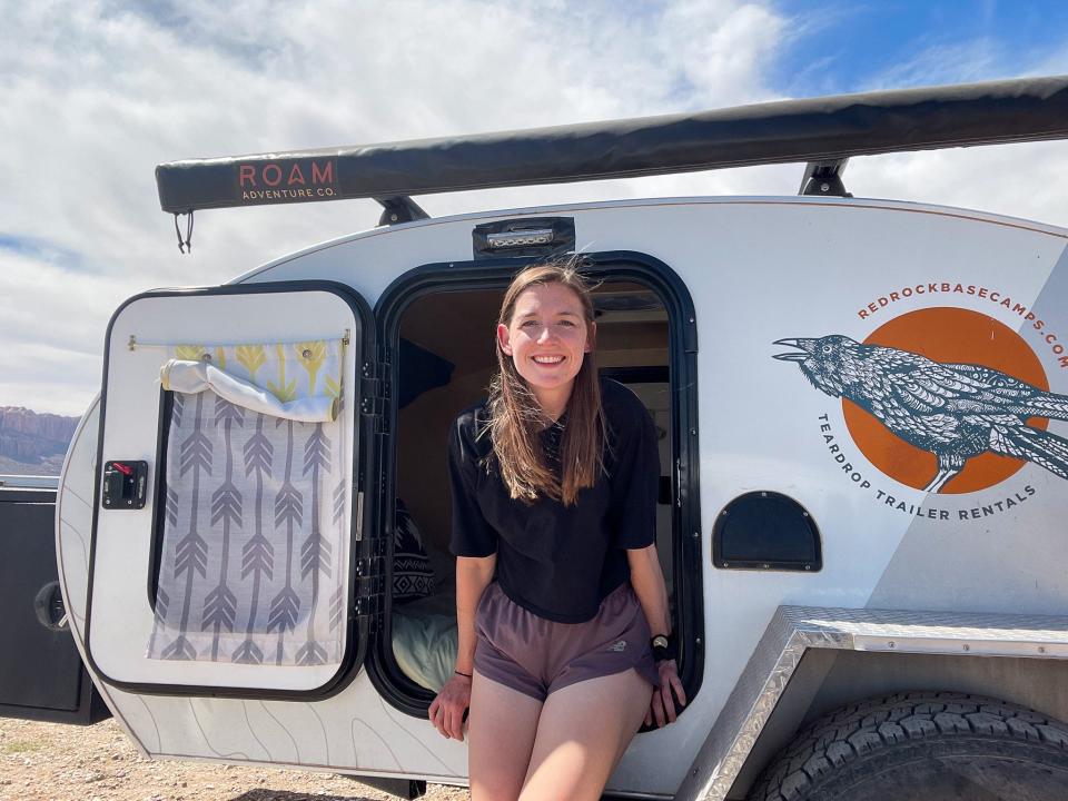 The author in front of the small camper.