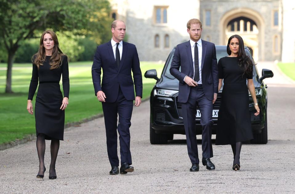 the prince and princess of wales accompanied by the duke and duchess of sussex greet wellwishers outside windsor castle