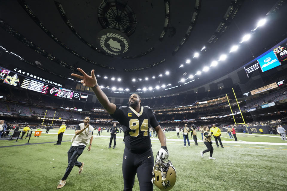 New Orleans Saints defensive end Cameron Jordan (94) celebrates as he leaves the field after an NFL football game against the Atlanta Falcons in New Orleans, Sunday, Jan. 7, 2024. (AP Photo/Gerald Herbert)