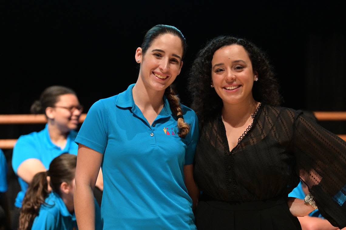Miami Children’s Chorus executive director Annie Mendez, left, and artistic director Liana Salinas, right, sang in the chorus when they were children.