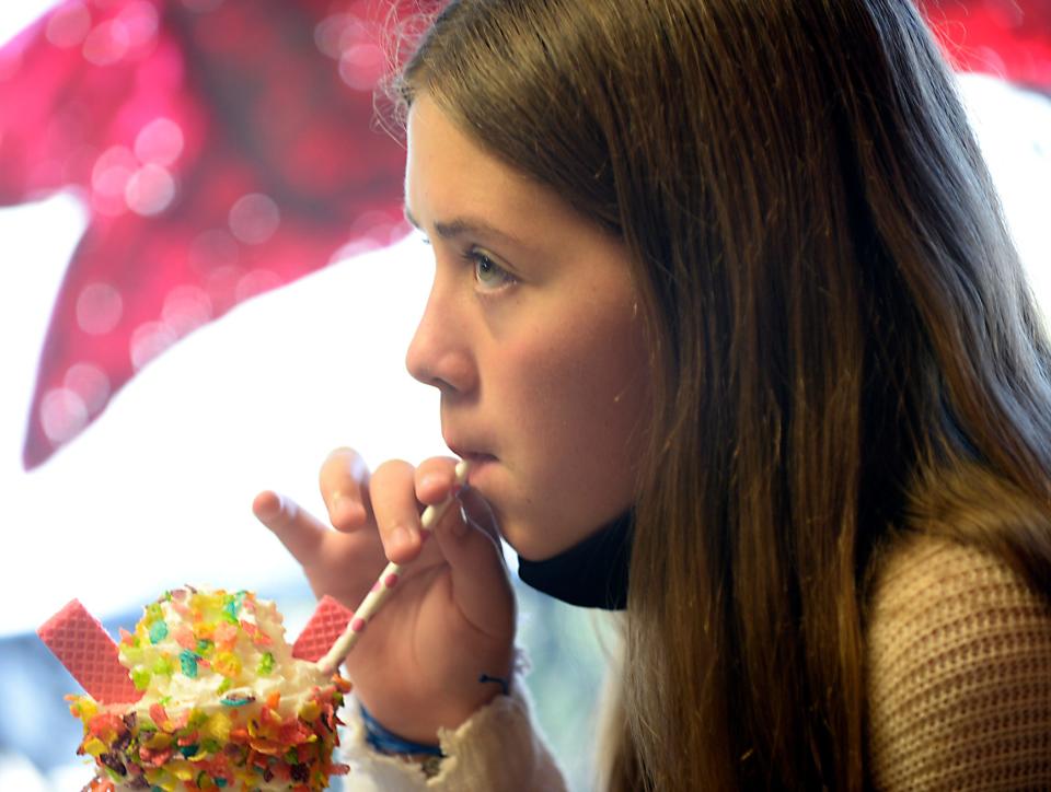 Emma Reid Cash, 12, of Chesnee, take time to have her ice cream treat at the Ice Cream Barn in Chesnee on Sept. 30, 2020.