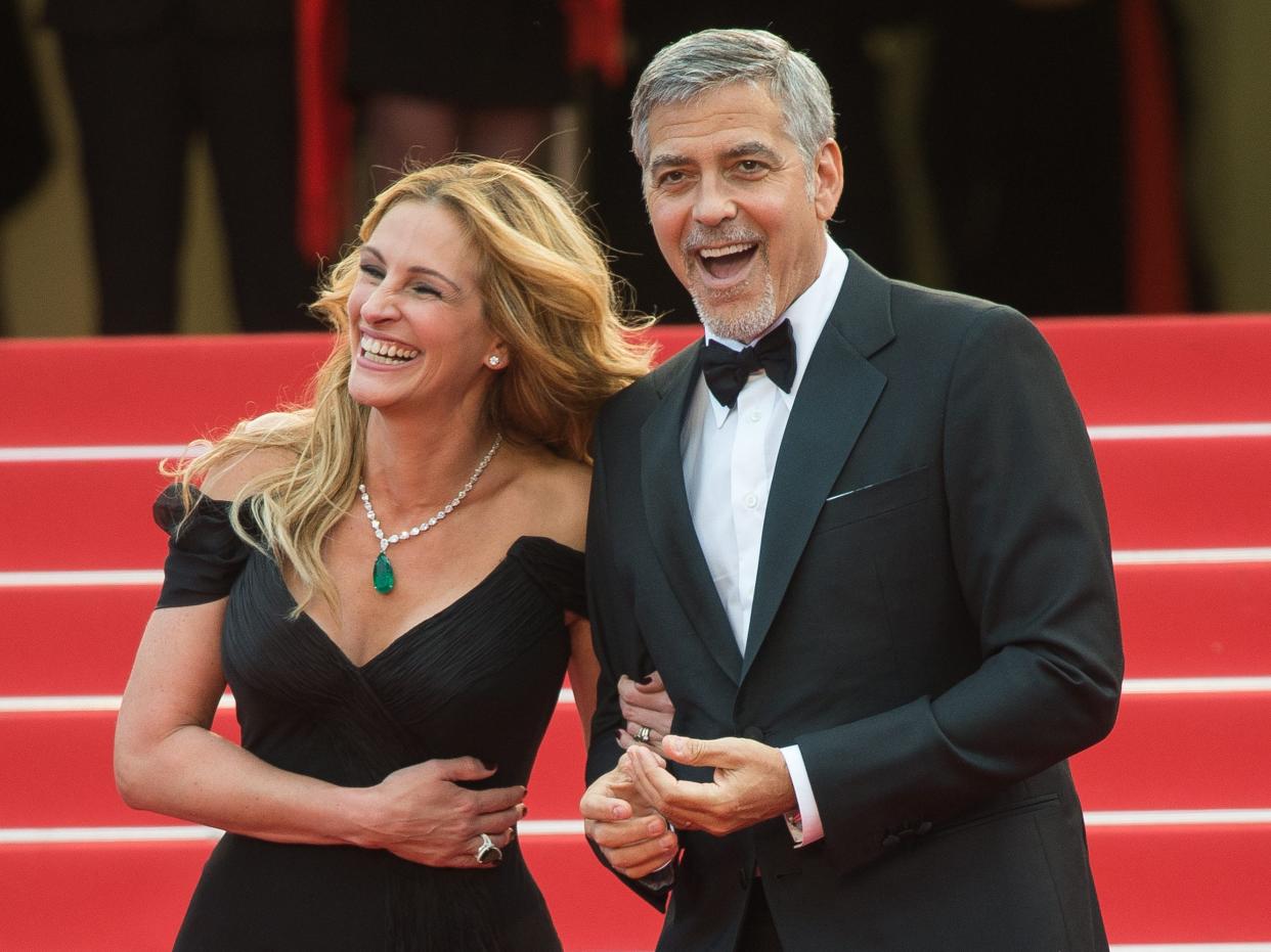 Julia Roberts and George Clooney laugh at the Cannes Film Festival