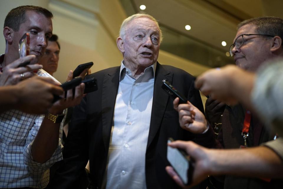 Dallas Cowboys owner Jerry Jones speaks to reporters during NFL meetings.