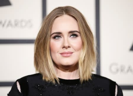 File photo: Singer Adele arrives at the 58th Grammy Awards in Los Angeles, California February 15, 2016. REUTERS/Danny Moloshok/File Photo