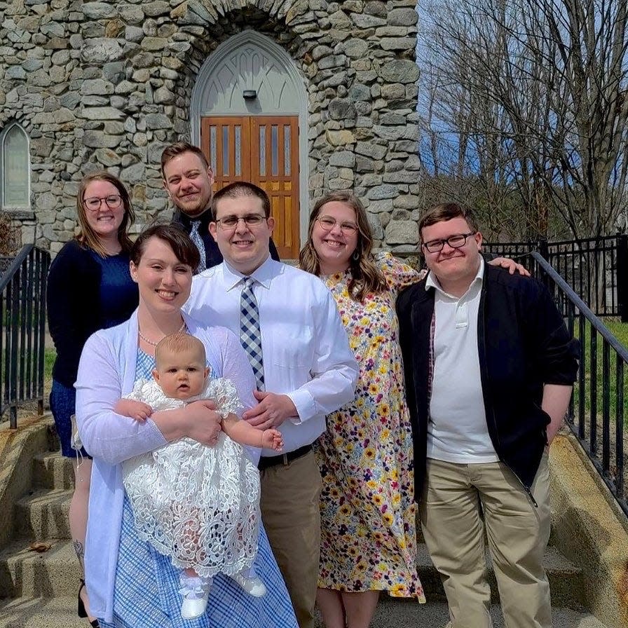 It's Tim, Meghan and the Christ family celebrating Holly's baptism.