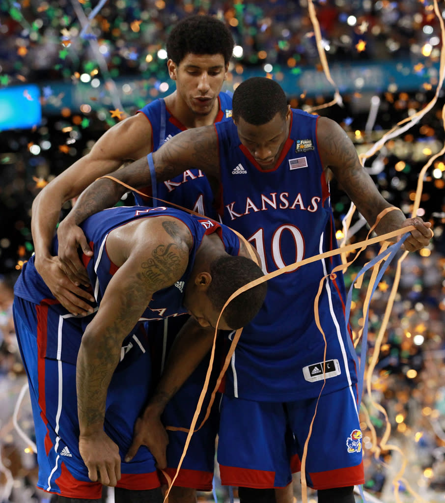 Thomas Robinson #0 and Tyshawn Taylor #10 of the Kansas Jayhawks react after losing to the Kentucky Wildcats 67-59 in the National Championship Game of the 2012 NCAA Division I Men's Basketball Tournament at the Mercedes-Benz Superdome on April 2, 2012 in New Orleans, Louisiana. (Photo by Ronald Martinez/Getty Images)