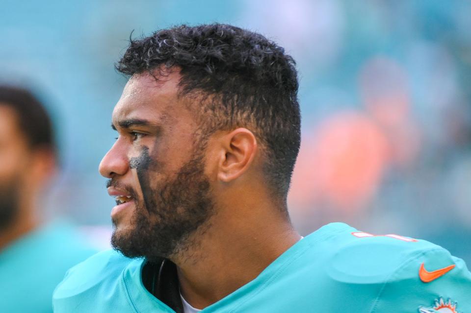 Miami Dolphins quarterback Tua Tagovailoa (1) is seen on the field during pre-game warm-ups prior to the start of the NFL game against the New York Jets at Hard Rock Stadium in Miami Gardens, FL, on December 19, 2021.