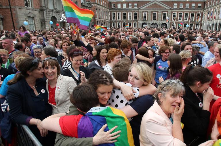 Supporters react outside Dublin Castle following the announcement of the result of the same-sex marriage referendum on May 23, 2015