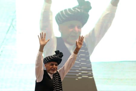 FILE PHOTO: Afghan presidential candidate Ashraf Ghani gestures during his election campaign rally in Kabul