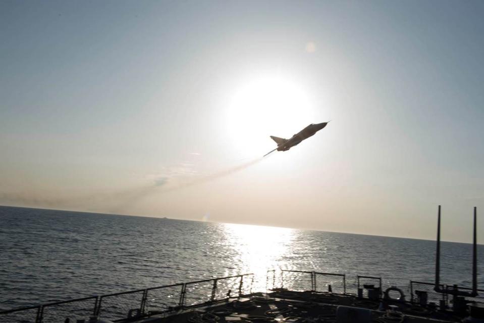 russian sukhoi su 24 attack aircraft makes low altitude pass by uss donald cook