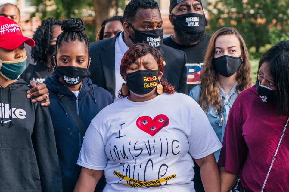 Ju'Niyah Palmer, Breonna Taylor's sister; Tamika Mallory, civil rights activist; Tamika Palmer, mother of Breonna Taylor; and attorney Lonita Baker arrive ahead of a news conference in Louisville. (Photo: Brandon Bell via Getty Images)