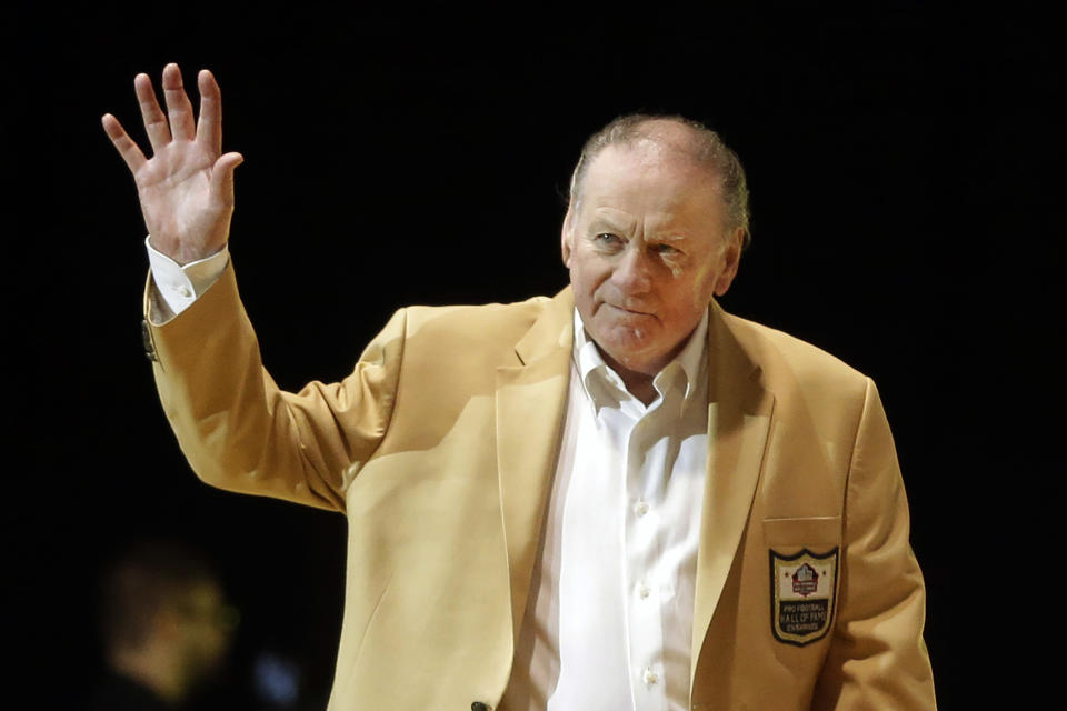 FILE - Len Dawson is introduced before the inaugural Pro Football Hall of Fame Fan Fest Friday, May 2, 2014, at the International Exposition Center in Cleveland. Hall of Fame quarterback Len Dawson, who helped the Kansas City Chiefs to a Super Bowl title, died Wednesday, Aug. 24, 2022. He was 87. (AP Photo/Mark Duncan, File)