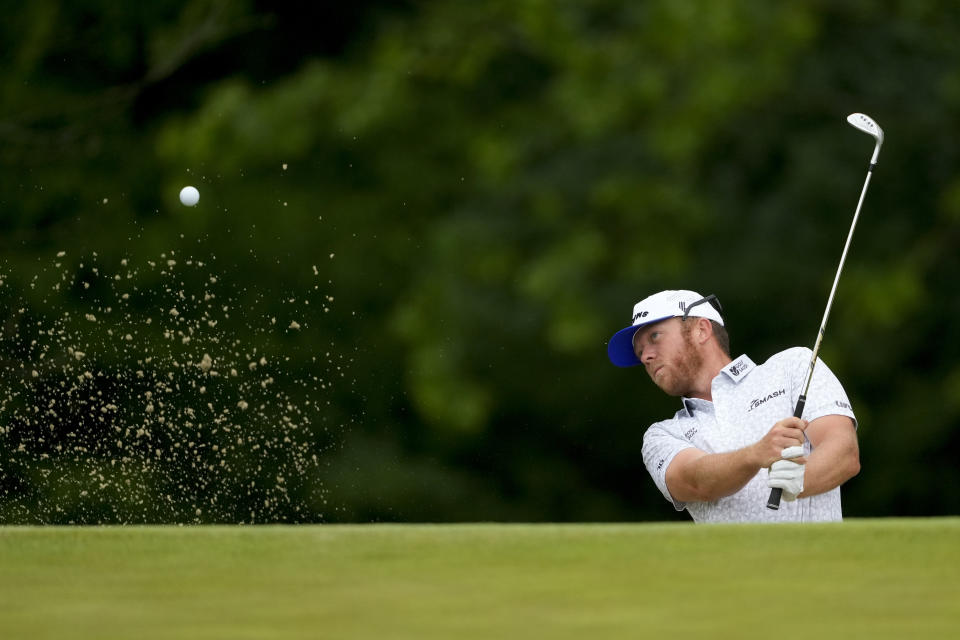 Taylor Gooch hits from the bunker on the third hole during a practice round for the PGA Championship golf tournament at the Valhalla Golf Club, Wednesday, May 15, 2024, in Louisville, Ky. (AP Photo/Matt York)
