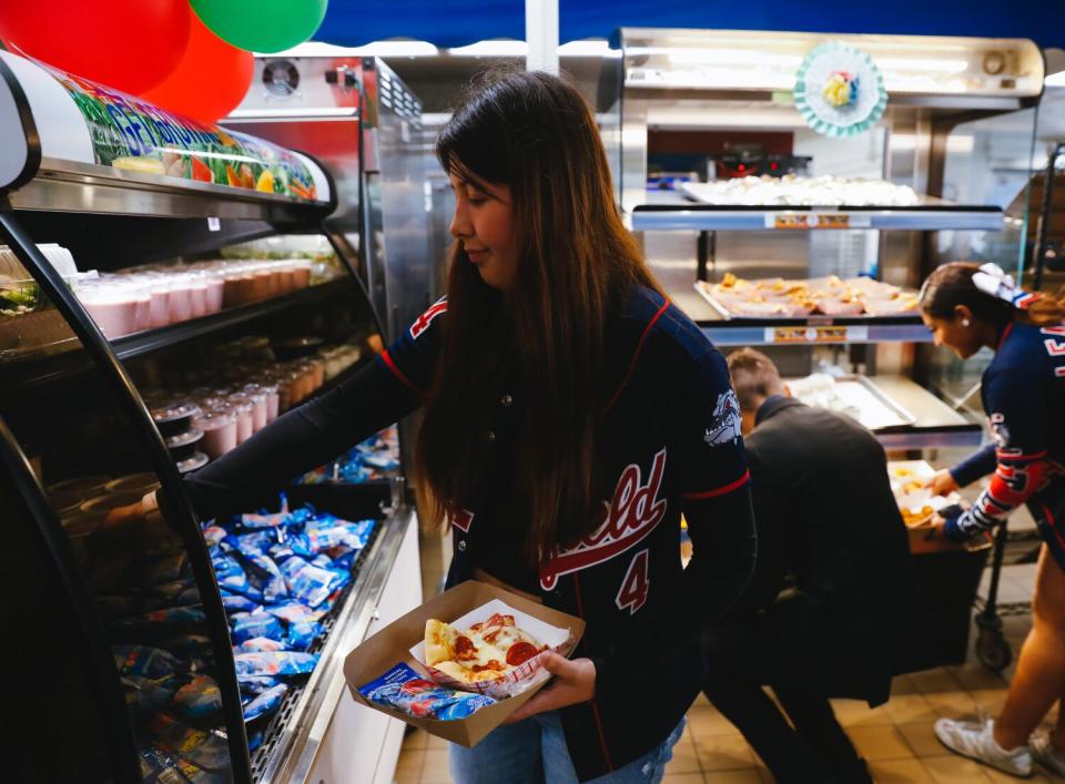 Students pick lunch items in a cafeteria