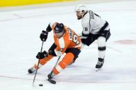 Feb 7, 2019; Philadelphia, PA, USA; Philadelphia Flyers right wing Jakub Voracek (93) skates past Los Angeles Kings defenseman Drew Doughty (8) during overtime at Wells Fargo Center. Mandatory Credit: Bill Streicher-USA TODAY Sports