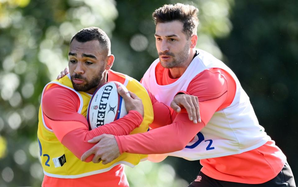 Joe Marchant of England is tackled by Jonny May of England during a training session at Pennyhill Park - RFU