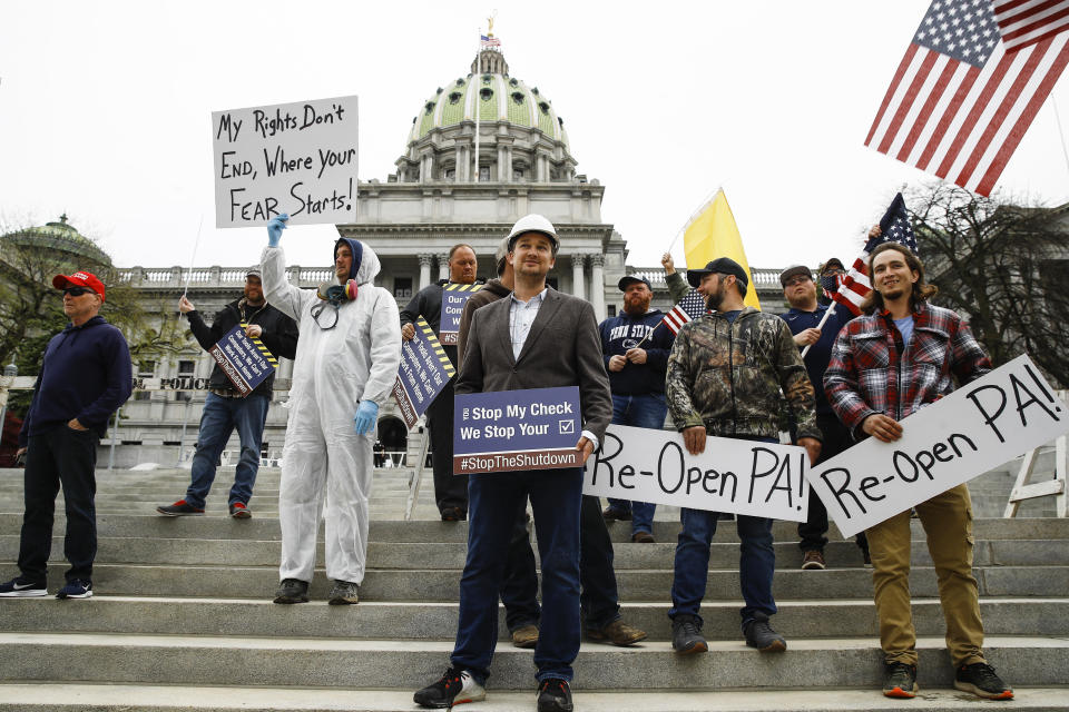 Protesters demonstrate at the state Capitol in Harrisburg, Pennsylvania, demanding that Gov. Tom Wolf reopen Pennsylvania's economy.