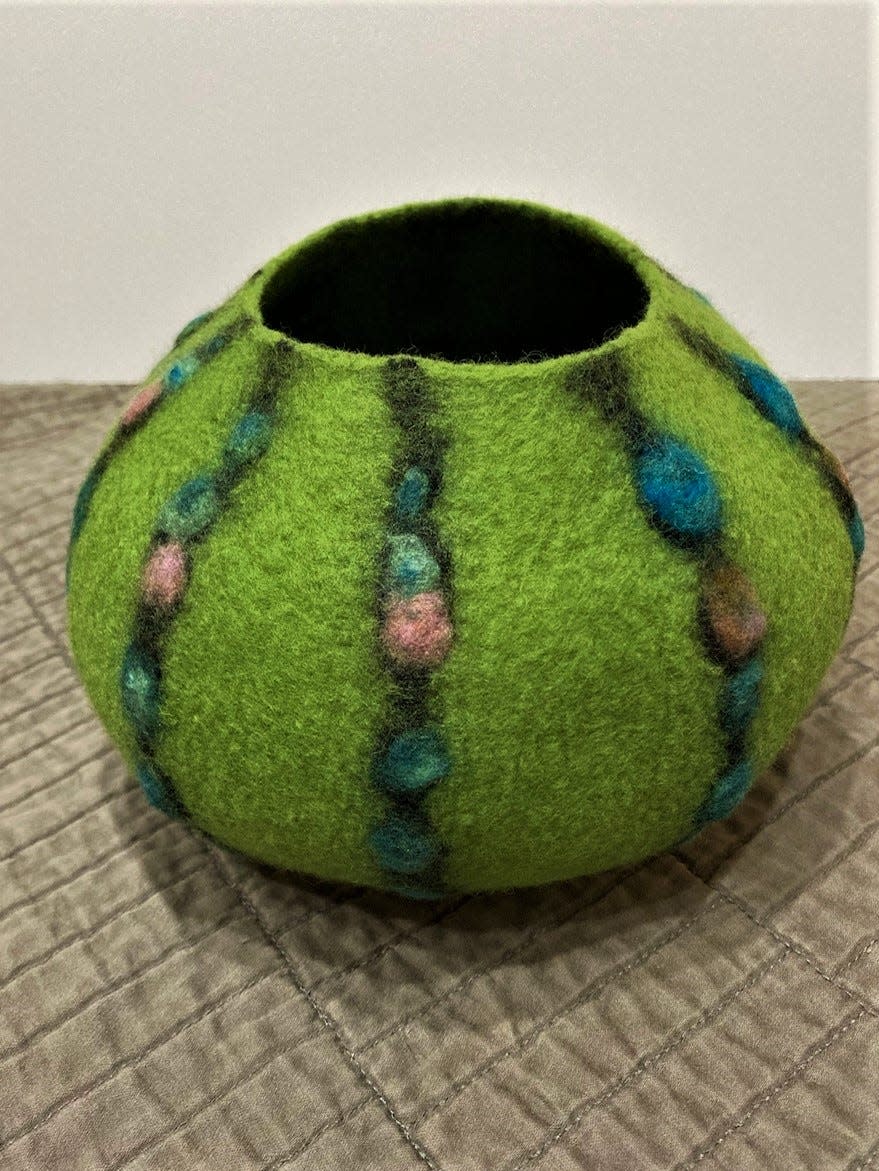 On Saturday, Feb. 24, Cindy Stroud of the Space Coast Weavers and Fiber Artists will lead a workshop on Nuno felting at the Merritt Island Public Library. Felting is a process that creates a non-woven textile from wool or other animal fibers. Nuno felting incorporates a fabric such as silk, as shown in this bowl.