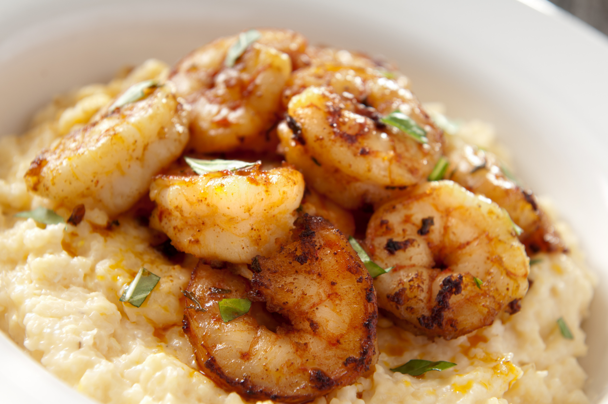 Closeup of Shrimp and Cheese Grits in a White Bowl