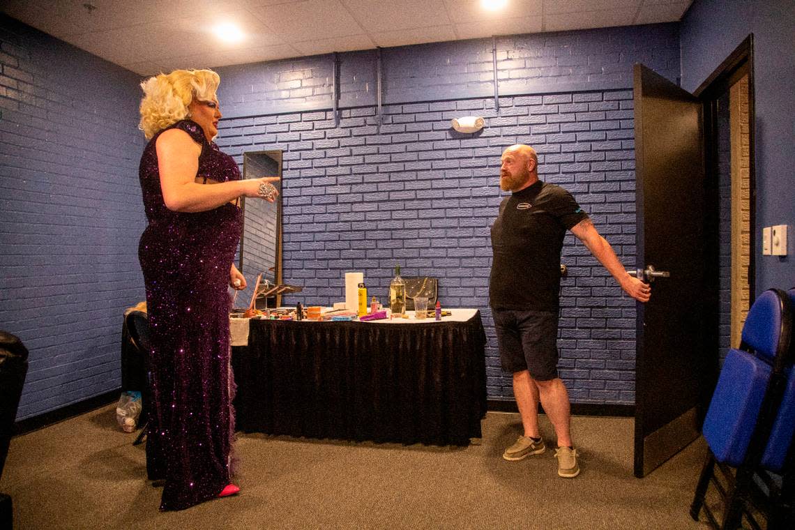 Brenda the 7-foot drag queen from Greensboro, left, gets a final curtain call before hosting North Carolina’s oldest running drag show, Green Queen Bingo, which dates to 2004 and regularly fills Piedmont Hall in Greensboro.