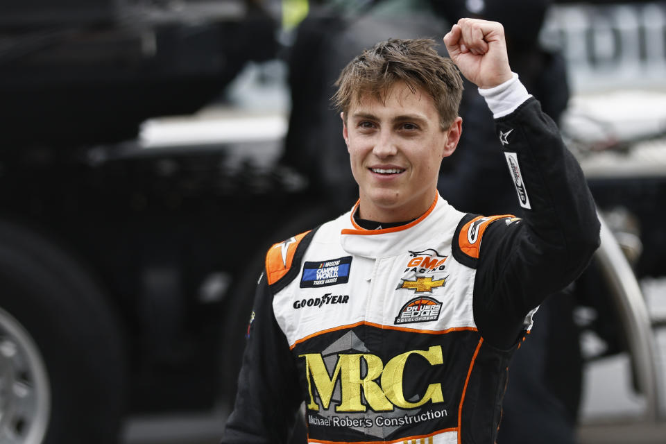 Driver Zane Smith reacts to fans after winning the NASCAR Truck Series race on Saturday, Oct. 30, 2021, in Martinsville, Va. (AP Photo/Wade Payne)