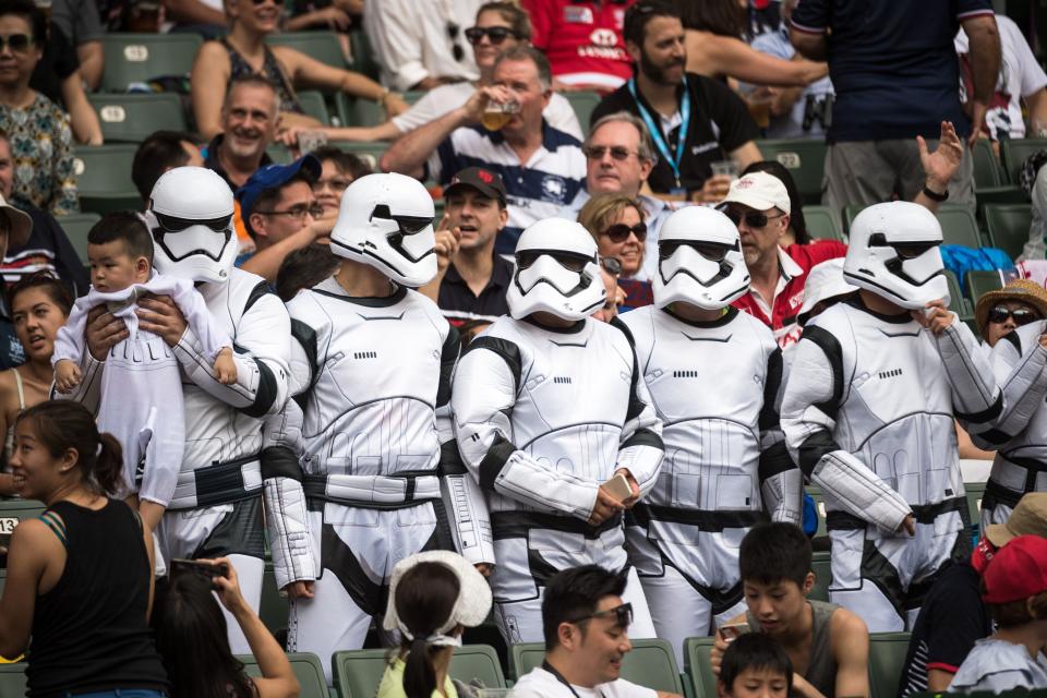 Fans dressed as Stormtroopers from the Star Wars films attend the Hong Kong Rugby Sevens tournament on April 9, 2017.