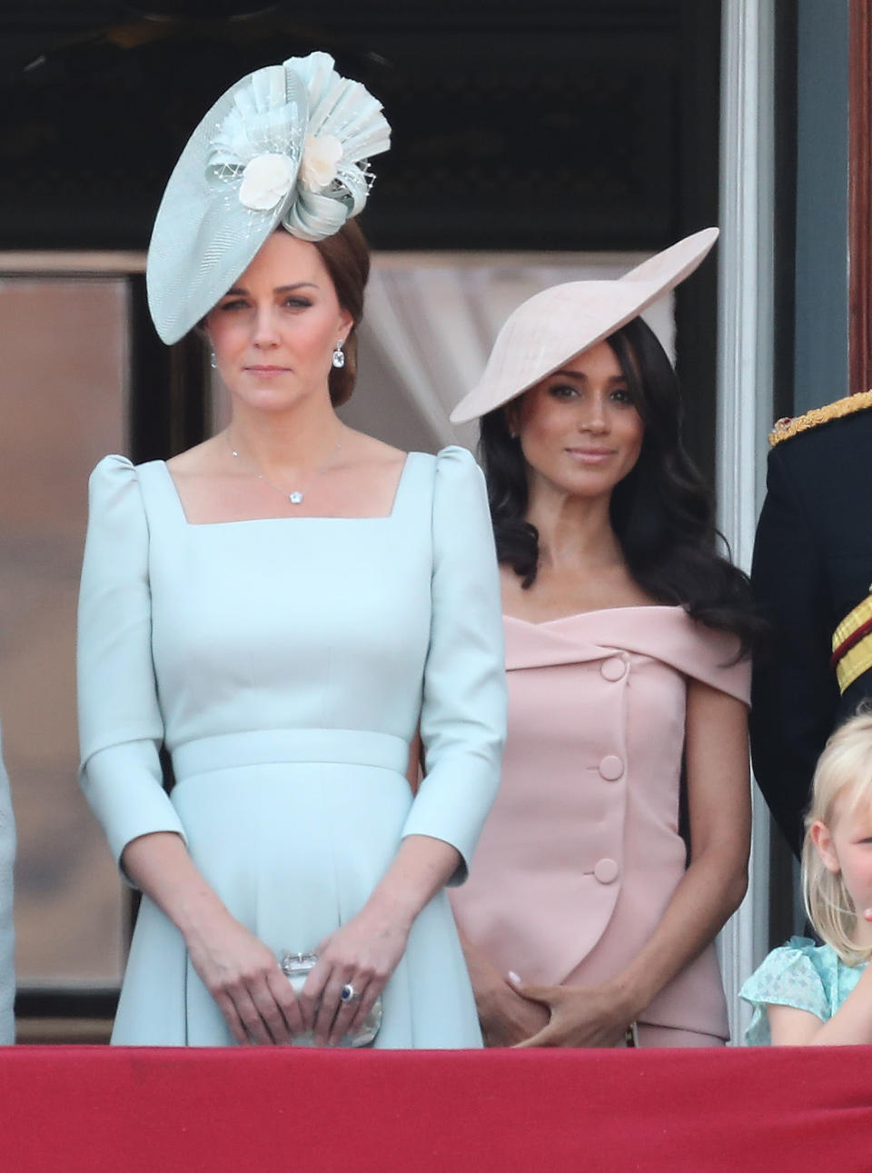 <p>Trooping of the Colour was undoubtedly Meghan’s first big royal outing, and for the occassion she decided on a pink Carolina Herrera skirt suit. Some suggested the cold-shoulder shape of the dress was a breach of royal protocol. To accessorise, she recycled the same bespoke Philip Treacy hat and wore a Carolina Herrera clutch. <em>[Photo: Getty]</em> </p>